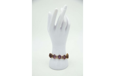 Pulseira de ouro amarelo poliarticulada com pedras roxas