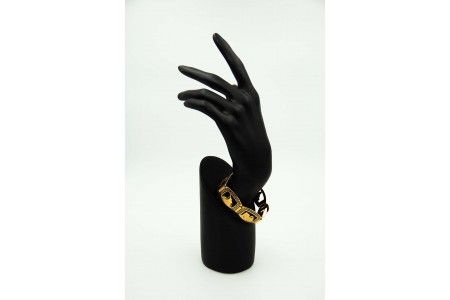  Pulseira larga e articulada em ouro amarelo com recortes 