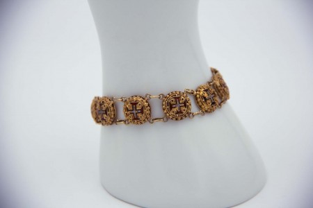  Pulseira articulada em ouro amarelo com cruzes da Ordem de Cristo em esmalte 