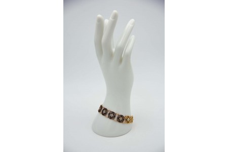 Pulseira articulada em ouro amarelo com figuras geométricas em esmalte