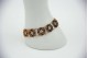 Pulseira articulada em ouro amarelo com figuras geométricas em esmalte