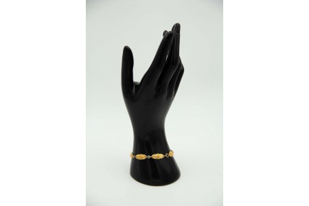 Pulseira de ouro e prata multi articulada com elos em forma de rosas relevadas