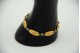 Pulseira de ouro e prata multi articulada com elos em forma de rosas relevadas