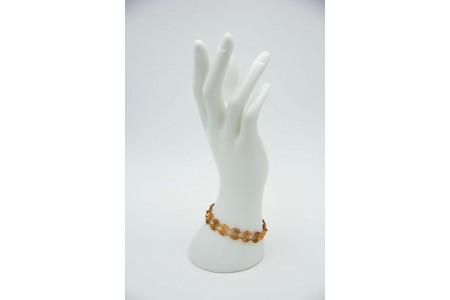 Pulseira articulada de ouro amarelo com padrões de flores ao estilo de filigrana
