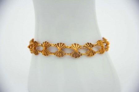Pulseira articulada de ouro amarelo com padrões de flores ao estilo de filigrana