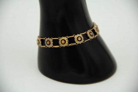 Pulseira articulada ao longo do corpo em ouro amarelo