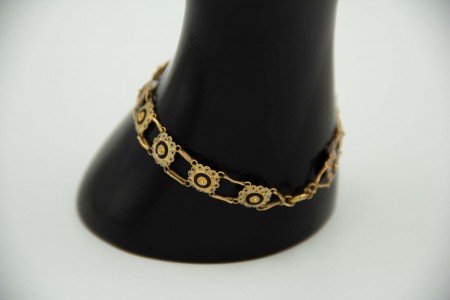 Pulseira articulada ao longo do corpo em ouro amarelo