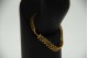 Pulseira de ouro amarelo com malha articulada