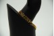 Pulseira de ouro amarelo com malha articulada