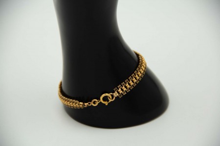 Pulseira simples articulada em ouro amarelo ao jeito de centopeia