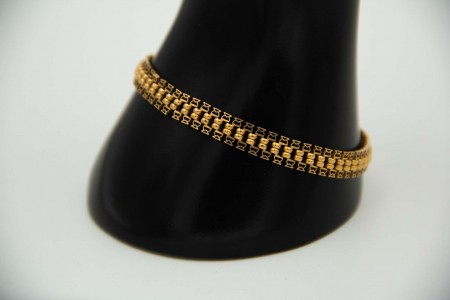 Pulseira simples articulada em ouro amarelo ao jeito de centopeia