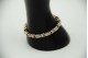 Pulseira em ouro bicolor com elos arternados e diamantes (60) em talhe brihante 