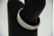 Pulseira oval em ouro branco com diamantes