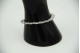 Pulseira de ouro branco articulada com padrões de gotas de água com diamantes