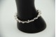Pulseira de ouro branco articulada com padrões de gotas de água com diamantes