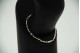 Pulseira de ouro branco articulada com pequenos diamantes