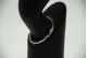 Pulseira articulada de ouro branco com diamantes (28) em talhe brilhante 8/8 