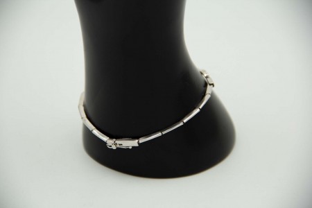 Pulseira de ouro branco articulada com diamantes (27) em talhe brilhante 8/8.
