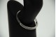 Pulseira de ouro branco articulada ao estilo de escrava em três fieiras