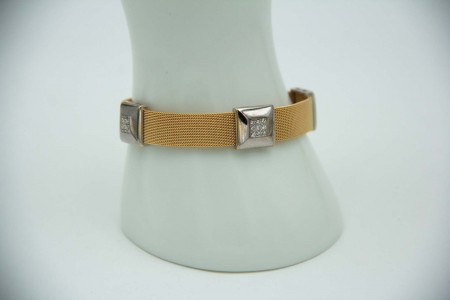 Pulseira de ouro bicolor com bracelete e diamantes (27) em talhe brilhante 8/8.