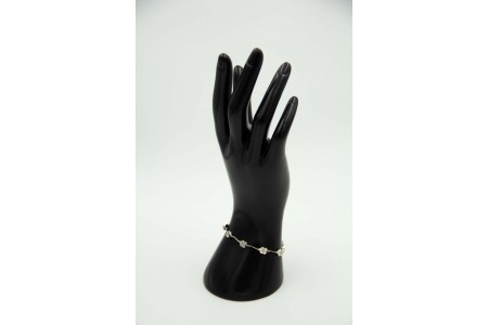 Pulseira de ouro branco articulada com elos recortados aplicação de diamantes (9