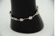 Pulseira de ouro branco articulada com elos recortados aplicação de diamantes (9