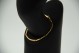 Pulseira articulada em ouro amarelo com elos alternados e (15) diamantes 