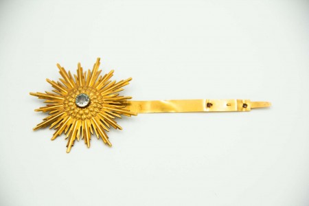 Resplendor em ouro com pedra no centro