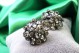 Par de brincos em ouro e prata redondos com zircónias e lascas de diamante.