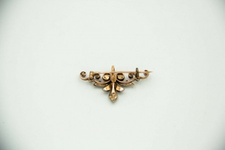 Pregadeira em ouro e prata com lascas de diamante