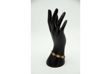 Pulseira de ouro e prata articulada com elos recortados e aplicação de lascas de