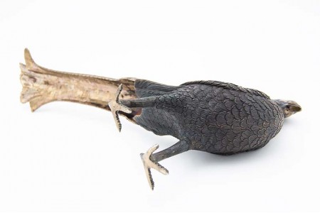 Par de faisões em prata cinzelada de caudas longas 