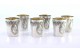 Conjunto de seis cálices para licor em prata com interiores em dourado e relevados com cartelas para monogramas.