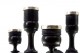 Conjunto de candelabros em pau preto com aplicações em prata nos fustes.