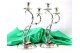  Candelabros em prata de dois lumes com hastes frisadas ao alto sobre folhas 
