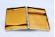 Cigarreira em prata lisa com interior dourado e tampa basculante.