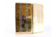 Cigarreira em prata e ouro com bandas ao alto com cartela para monograma, interior dourado e cabochão no fecho de abrir.