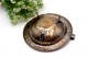 Cinzeiro em prata com relevos florais gravados e moeda de 400 reis no centro 
