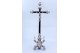Crucifixo em madeira de pau santo com Jesus em prata, símbolos cristãos e assente sobre três pés.