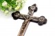 Crucifixo em madeira com aplicações em prata e argola de suspensão
