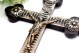 Crucifixo em madeira com aplicações em prata e argola de suspensão