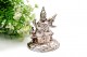 Estatueta em prata da dinvindade hindu saraswati com relevos e base em formato 