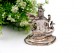 Estatueta em prata da dinvindade hindu saraswati com relevos e base em formato 