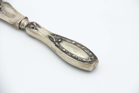 Faca de peixe em prata com recortes,