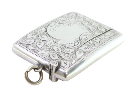 Fosforeira em prata com motivos florais gravados envolvendo cartela para monograma