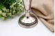 Jarra em prata com relevos florais e base circular com frisos
