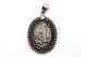 Medalha de prata em formato elíptico com Nossa Senhora e reverso com pastorinhos