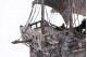  Caravela portuguesa em prata profusamente definida e assente em base de madeira.