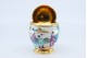 Pote em porcelana com cenas do quotidiano japonês com base e tampa em prata dourada.