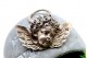 Anjo da Guarda em prata revelada em vulto perfeito com argola de suspensão.